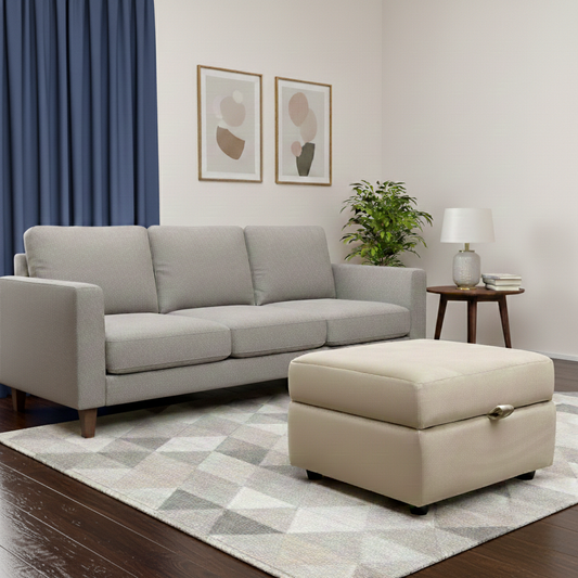 Living room of the DFS ‘Dawson’ Mink Velvet Storage Footstool, highlighting its internal storage compartment and soft-touch upholstery.