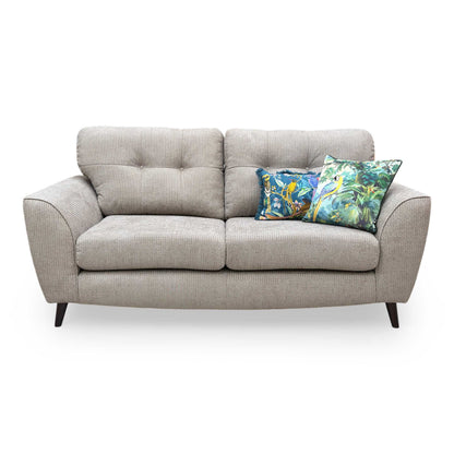 Front view of the DFS ‘Dawson’ 3 Seater Sofa in Mink plain woven fabric, featuring a clean, contemporary design with plush back cushions.