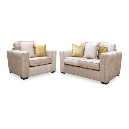 Chelsea beige velvet snuggler chair and 2 seater sofa, angled view from the left showing the square arms