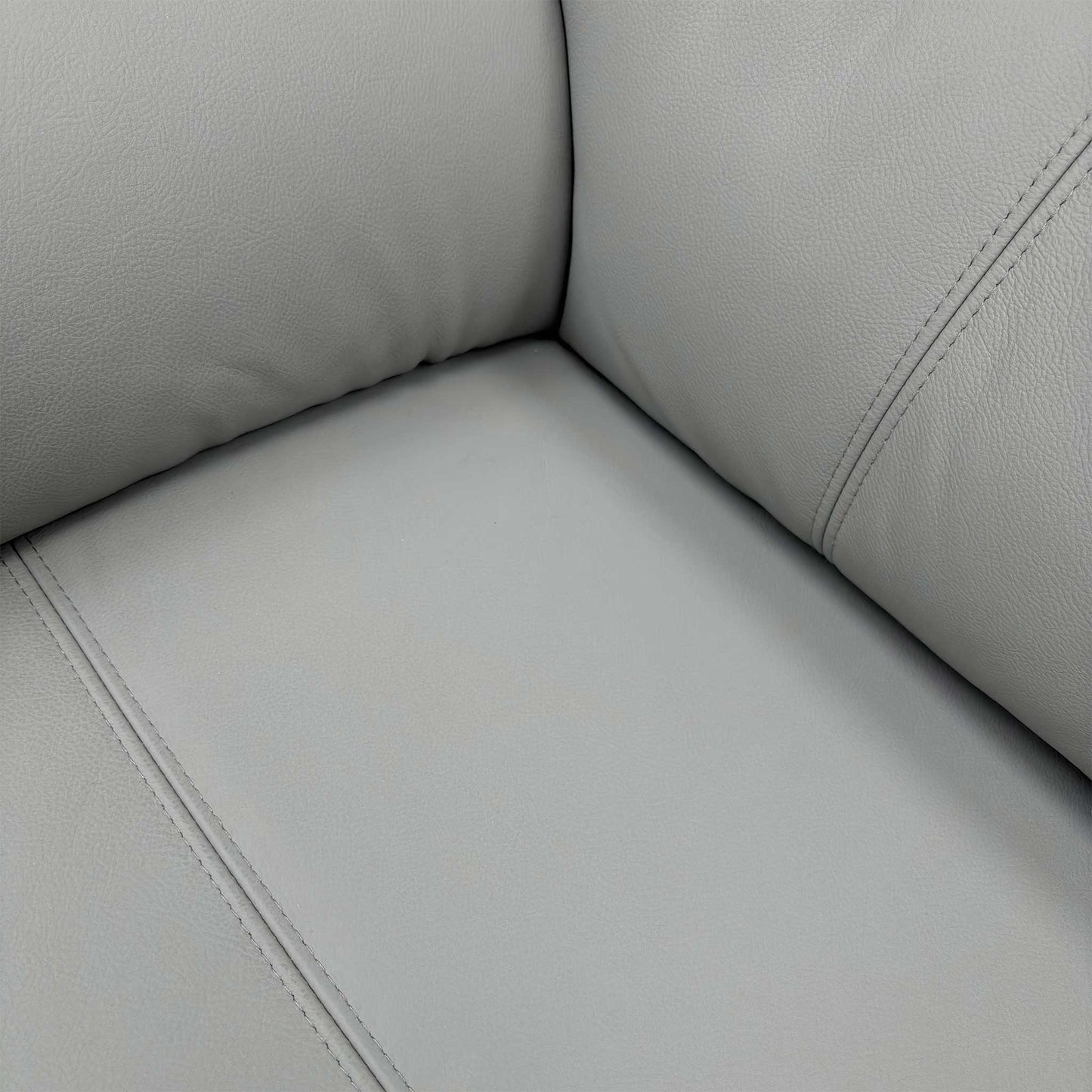 Close-up texture shot of the premium 100% top-grain grey leather upholstery and precision stitching.