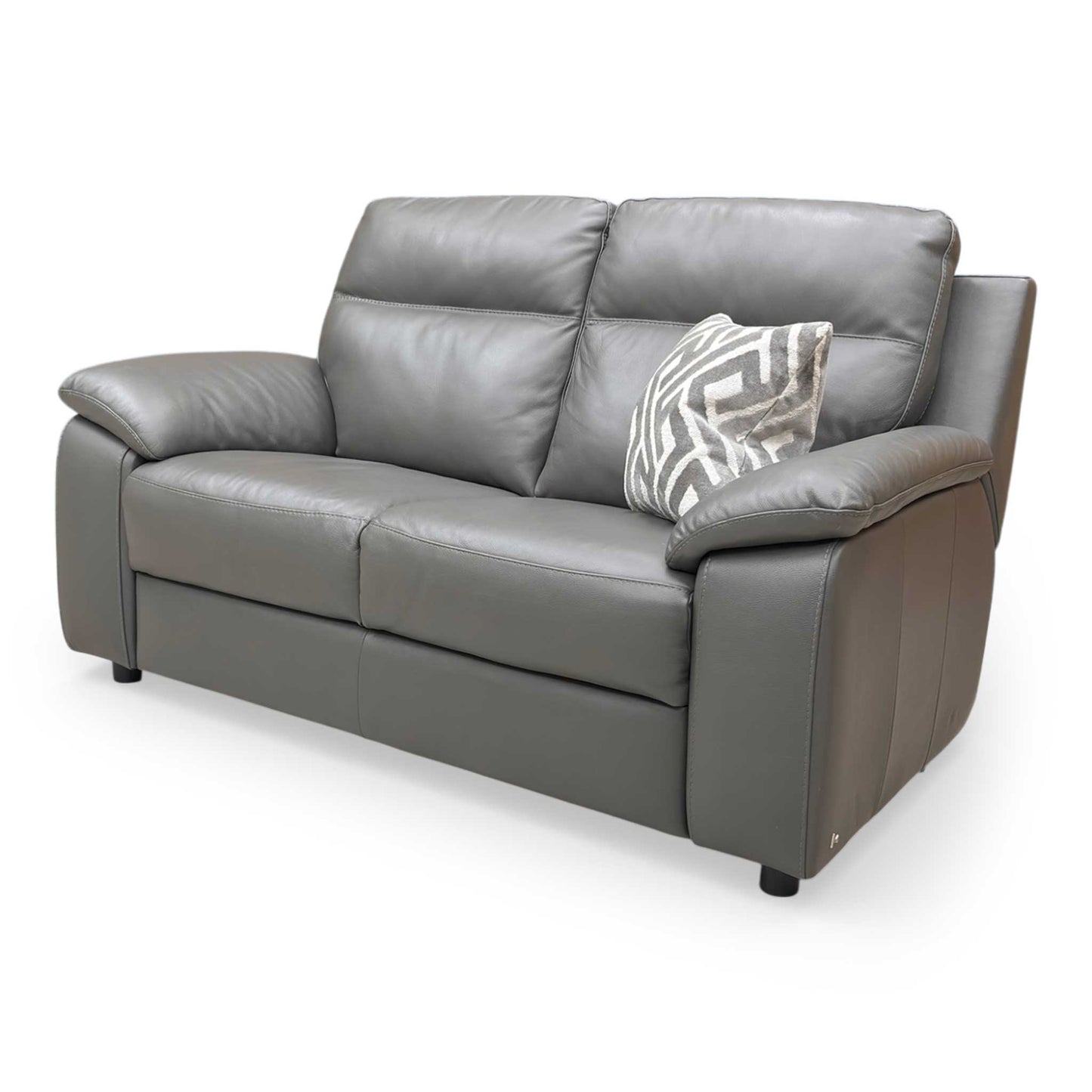 Side profile of the Nicoletti Pepino sofa, emphasizing the clean contemporary lines and the distinctive wide-track arm design.