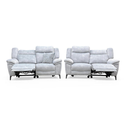 Front view of the Furniture Village ‘Panache’ 2+2 Seater Power Recliner Sofa Set in Dexter Smoke velvet, featuring contemporary curved arms and a high-back design.