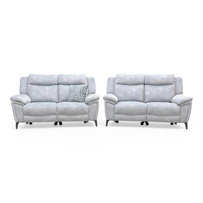 Front view of the Furniture Village ‘Panache’ 2+2 Seater Power Recliner Sofa Set in Dexter Smoke velvet, featuring contemporary curved arms and a high-back design.