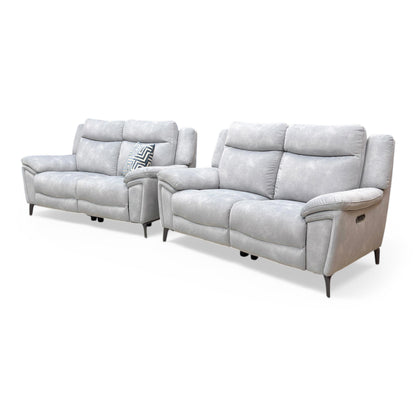 Angle view of the Panache sofa, emphasizing the contemporary open-base look and slim metal leg detail.