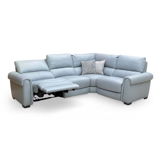 Full view of the World of Leather ‘Nixon’ Right Hand Facing Power Recliner Corner Sofa in Pearl Blue leather, featuring a modern low-profile design.