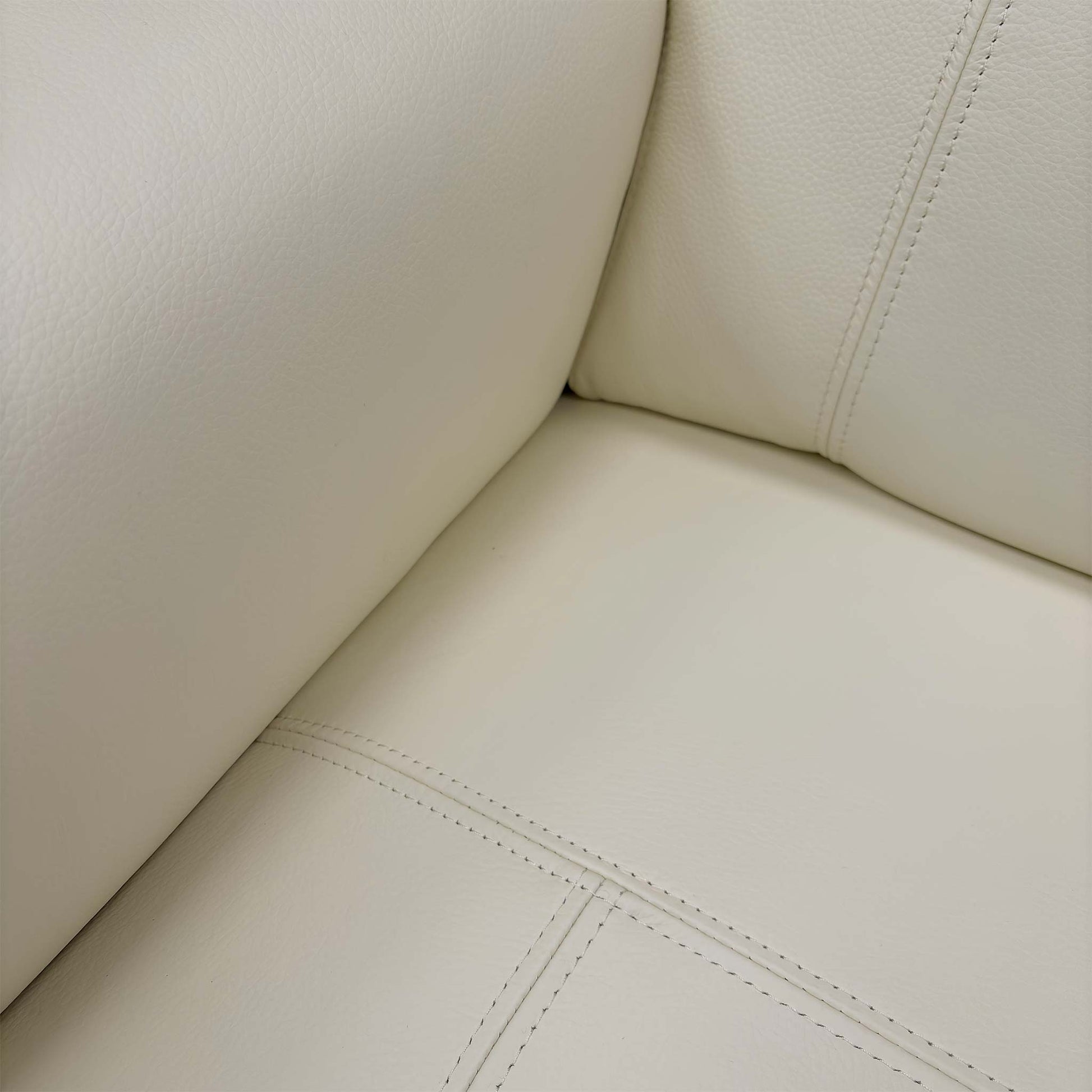 Close-up of the silver metallic U-shaped legs, emphasizing the chair's contemporary aesthetic and sturdy build quality.
