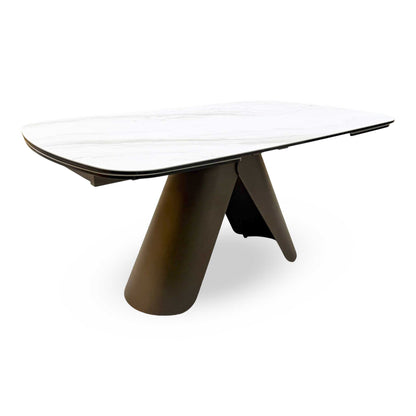 Side profile of the dining table, emphasizing the slim profile of the ceramic top and the heavy-duty support frame.