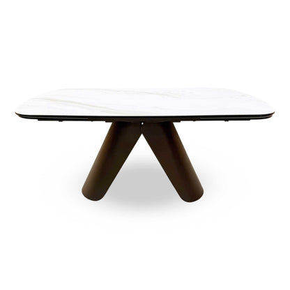 Rear perspective of the table in a dining room setting, illustrating its large scale and contemporary aesthetic.