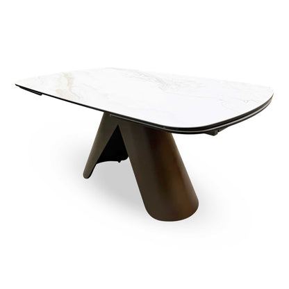 Detailed shot of the central pedestal base, showing the architectural black metal design and stable floor plate.