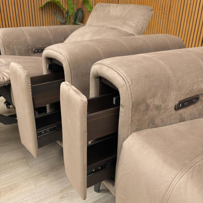 Detail view of the open storage compartment built into the sofa’s armrest, perfect for keeping remotes and essentials tucked away.