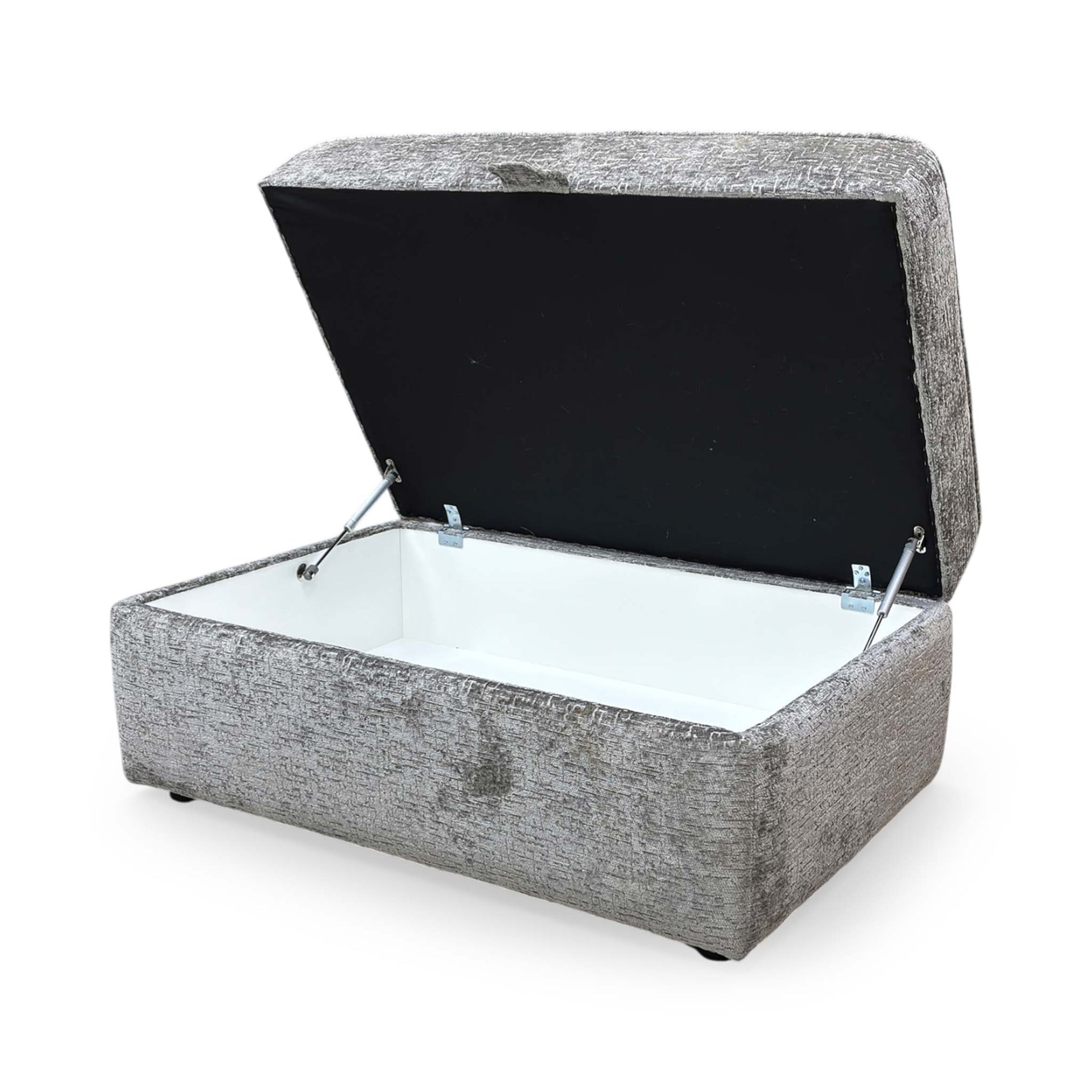 Side profile of the Sasha storage ottoman, emphasizing the clean lines, tailored piping detail, and the sturdy, low-profile base.