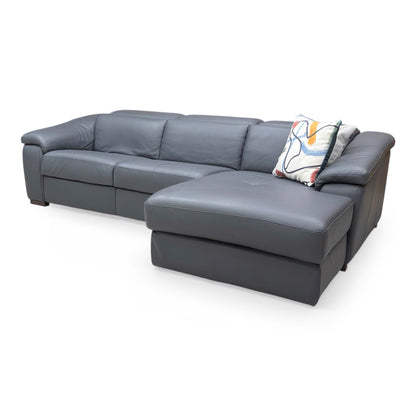 Side shot of the Galileo leather sofa, emphasizing the clean, modern lines, elegant armrest design, and the fully extended power recliner position.
