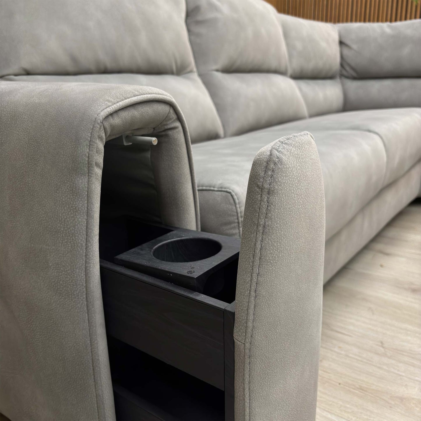 Close-up of the seating area and storage armrest of the ‘Flex’ Dove Grey fabric sofa, highlighting the plush cushioning and textured upholstery.
