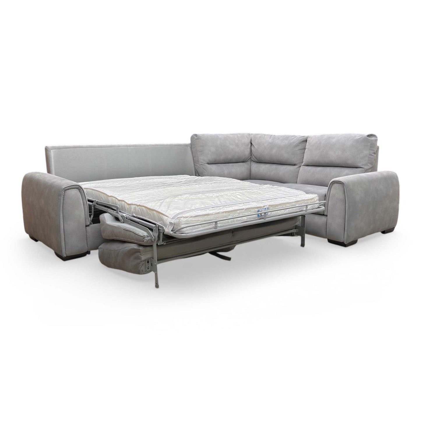 The ‘Flex’ sofa in sofa-bed mode, showing the pull-out mattress section fully extended.