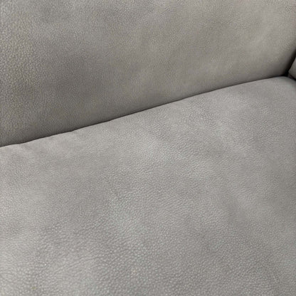 Close-up shot of the high-quality Dove Grey fabric upholstery and precision stitching details.