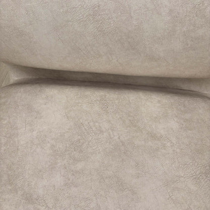 Detailed close-up of the plush Cream velvet upholstery and the smooth finish of the exposed dark wood armrest.