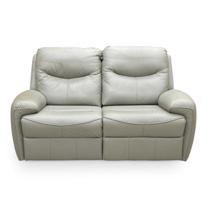 Front angle view emphasizing the plush tiered back cushions and deep-filled seat comfort of the 2-seater.