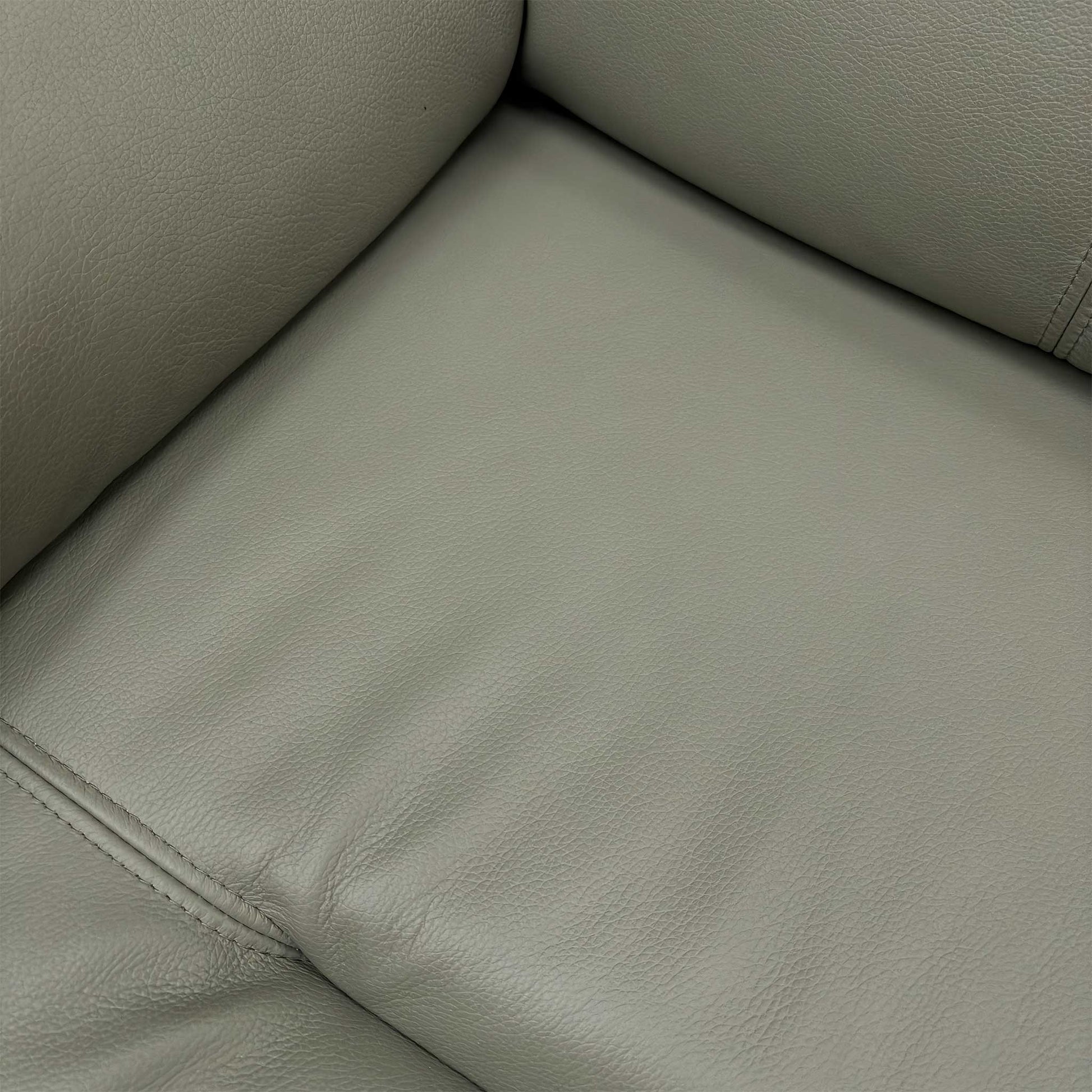 Detailed shot of the Cambridge Olive leather grain, showcasing the natural texture and high-quality stitching.