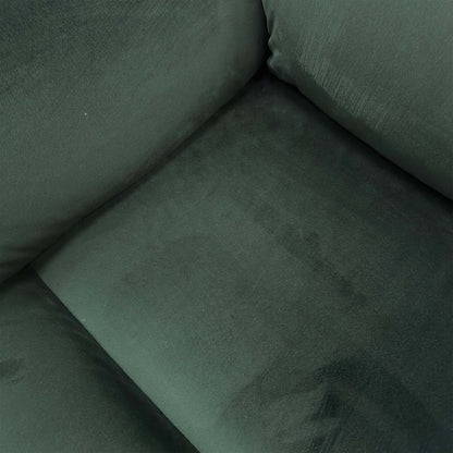 Detailed shot of the premium bottle green Opulence velvet fabric texture and stitched paneling.