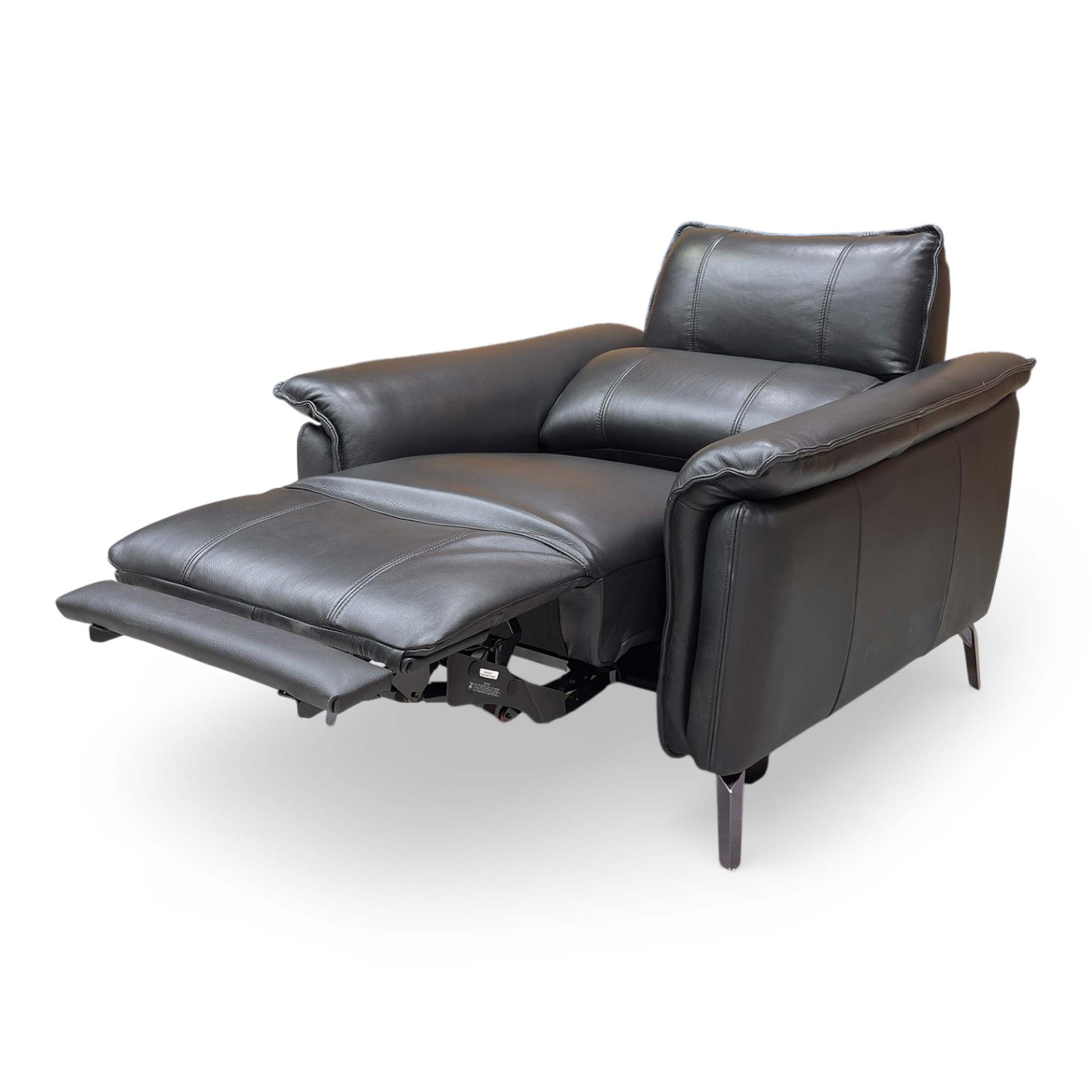 Side view of the ‘Jude’ Oslo leather chair fully reclined with the footrest extended, showcasing the full range of motion.
