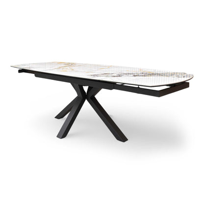 Side profile of the Doro dining table, emphasizing the sleek, slimline ceramic top and the sophisticated modern silhouette of the sculptural base.