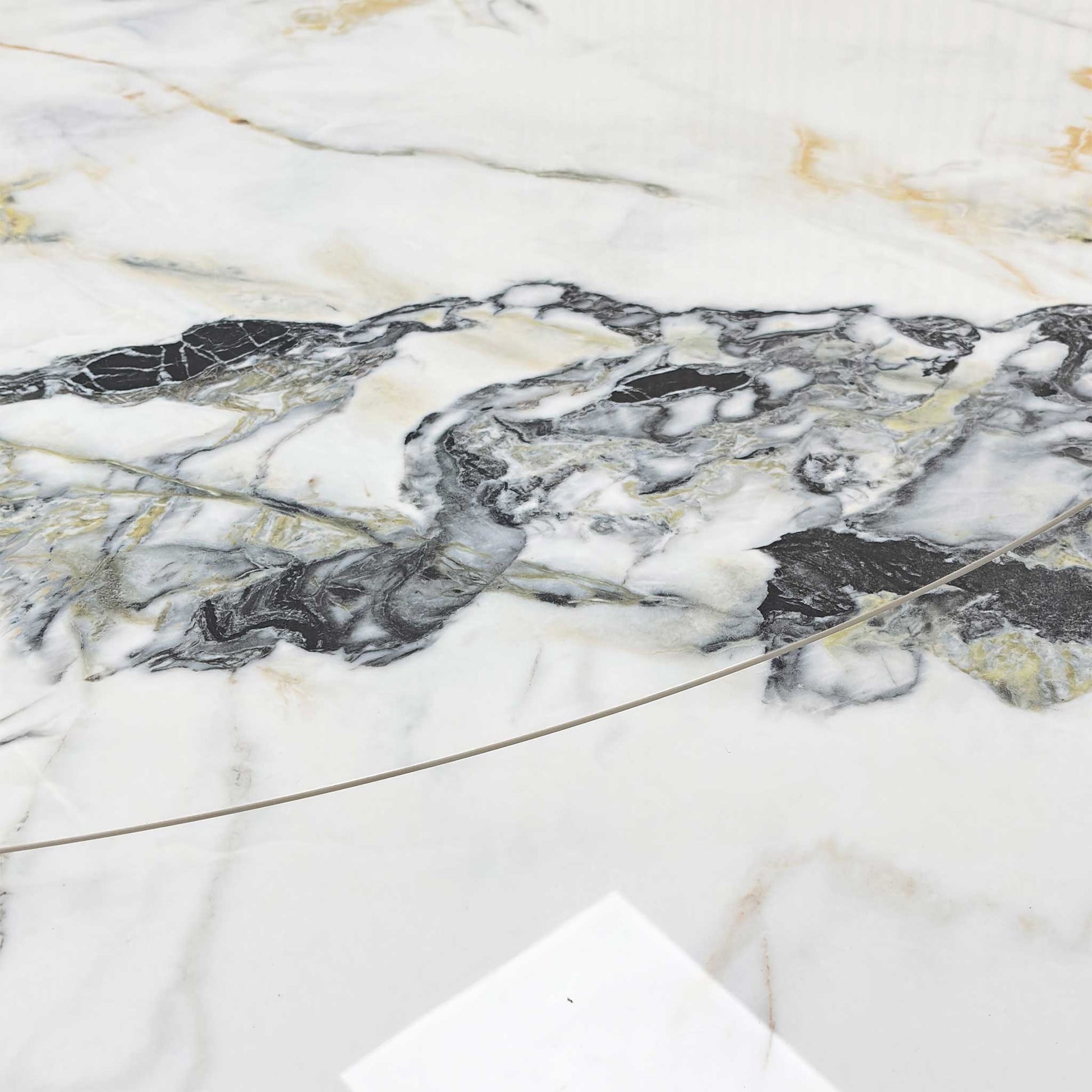 Close-up of the marble-effect ceramic surface, highlighting the realistic stone texture, high-quality finish, and durable construction.