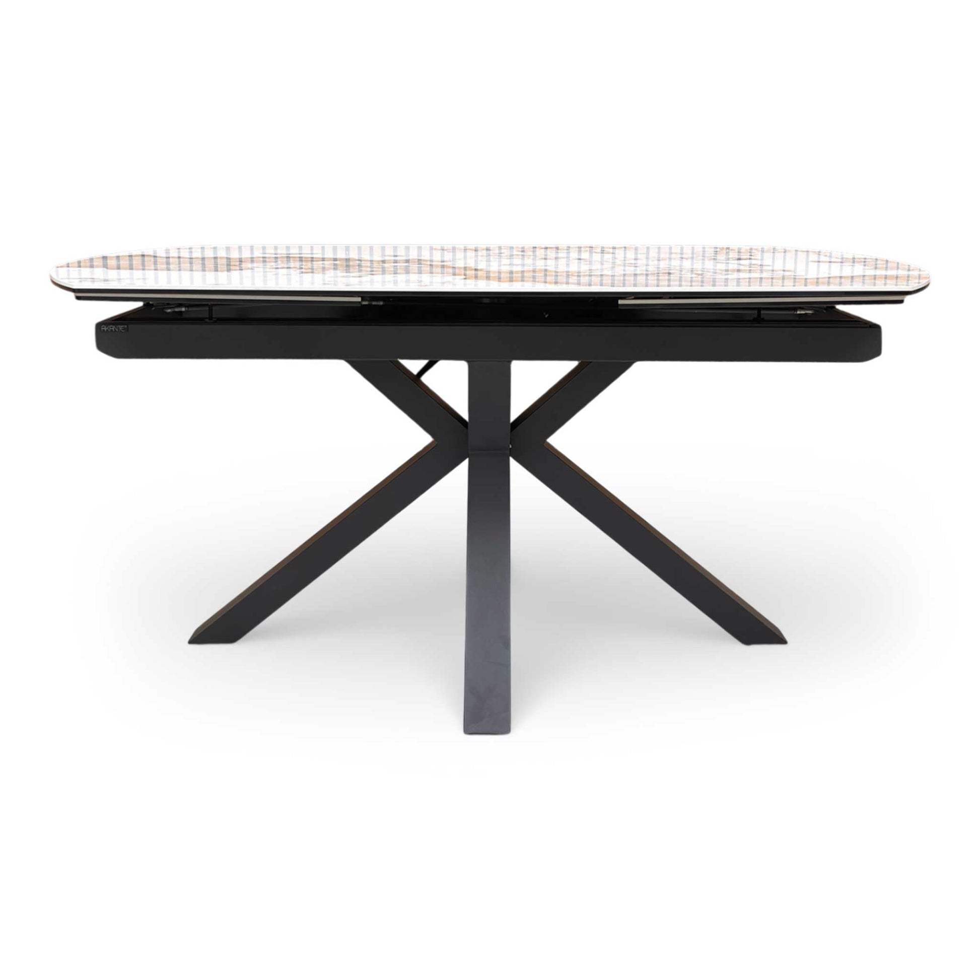 Front dining room setup featuring the Raul marble ceramic table and star-shaped legs.