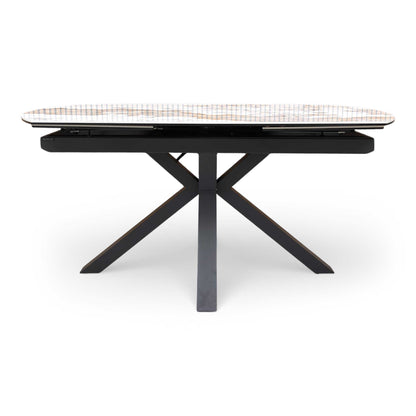 Front dining room setup featuring the Raul marble ceramic table and star-shaped legs.