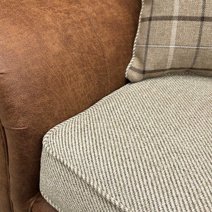 Close-up of the Sultan Oatmeal combination fabric and scatter cushions, highlighting the high-quality weave and soft, tactile upholstery finish.