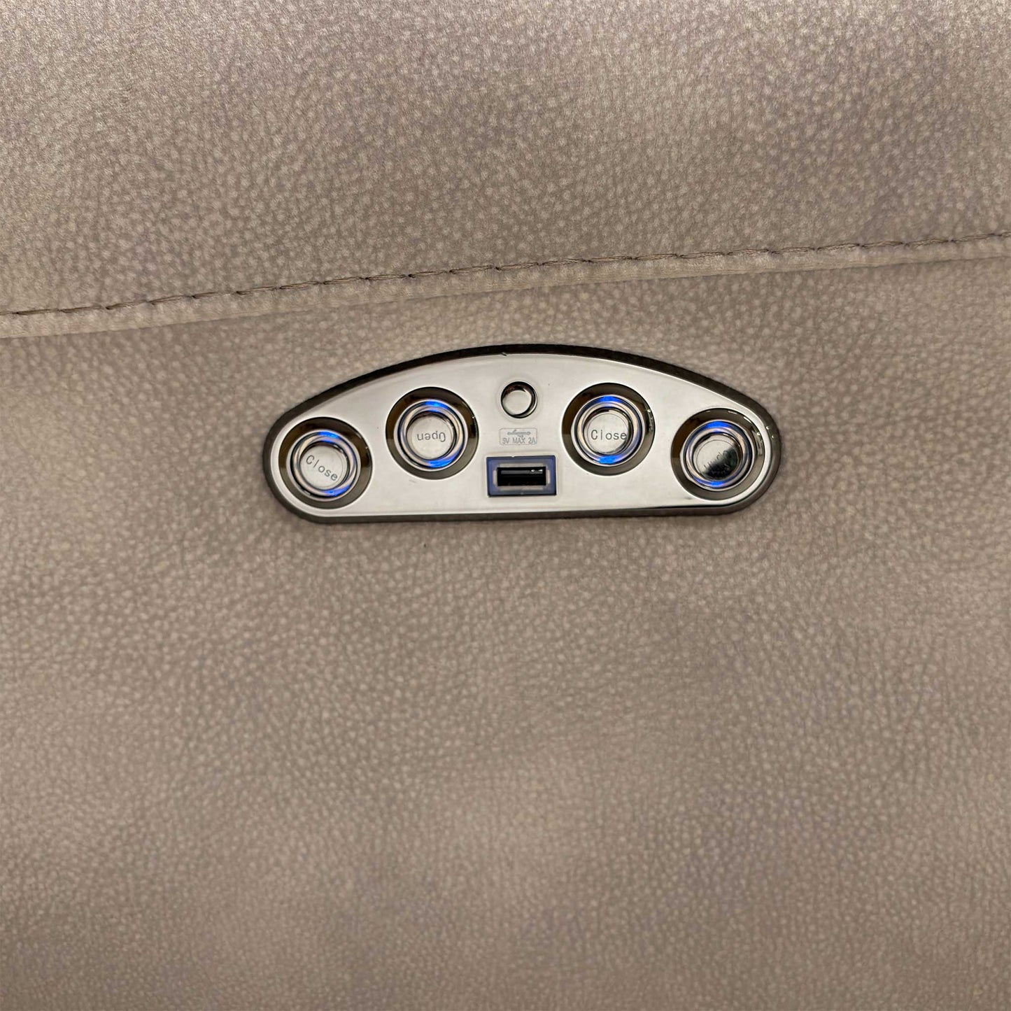 Close-up of the Silver fabric upholstery, highlighting the durable woven texture, subtle sheen, and high-quality contrast stitching.