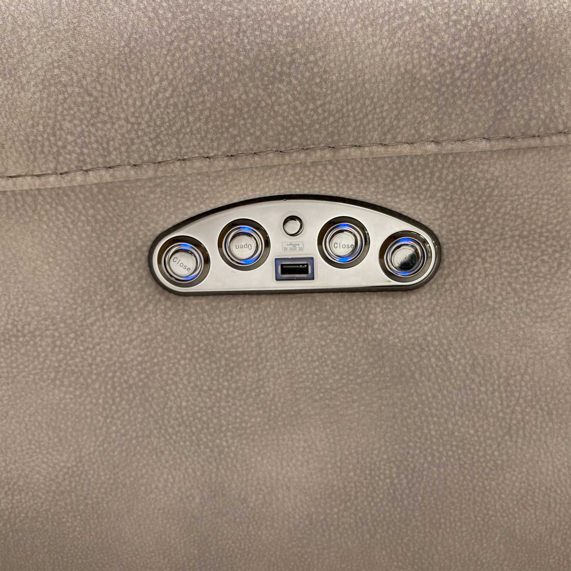 Close-up of the Silver fabric upholstery, highlighting the durable woven texture, subtle sheen, and high-quality contrast stitching.