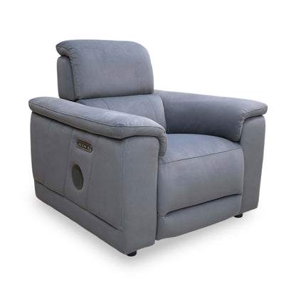 Side profile of the Genius chair in a fully reclined position, emphasizing the ergonomic support and the streamlined integration of the power mechanisms.
