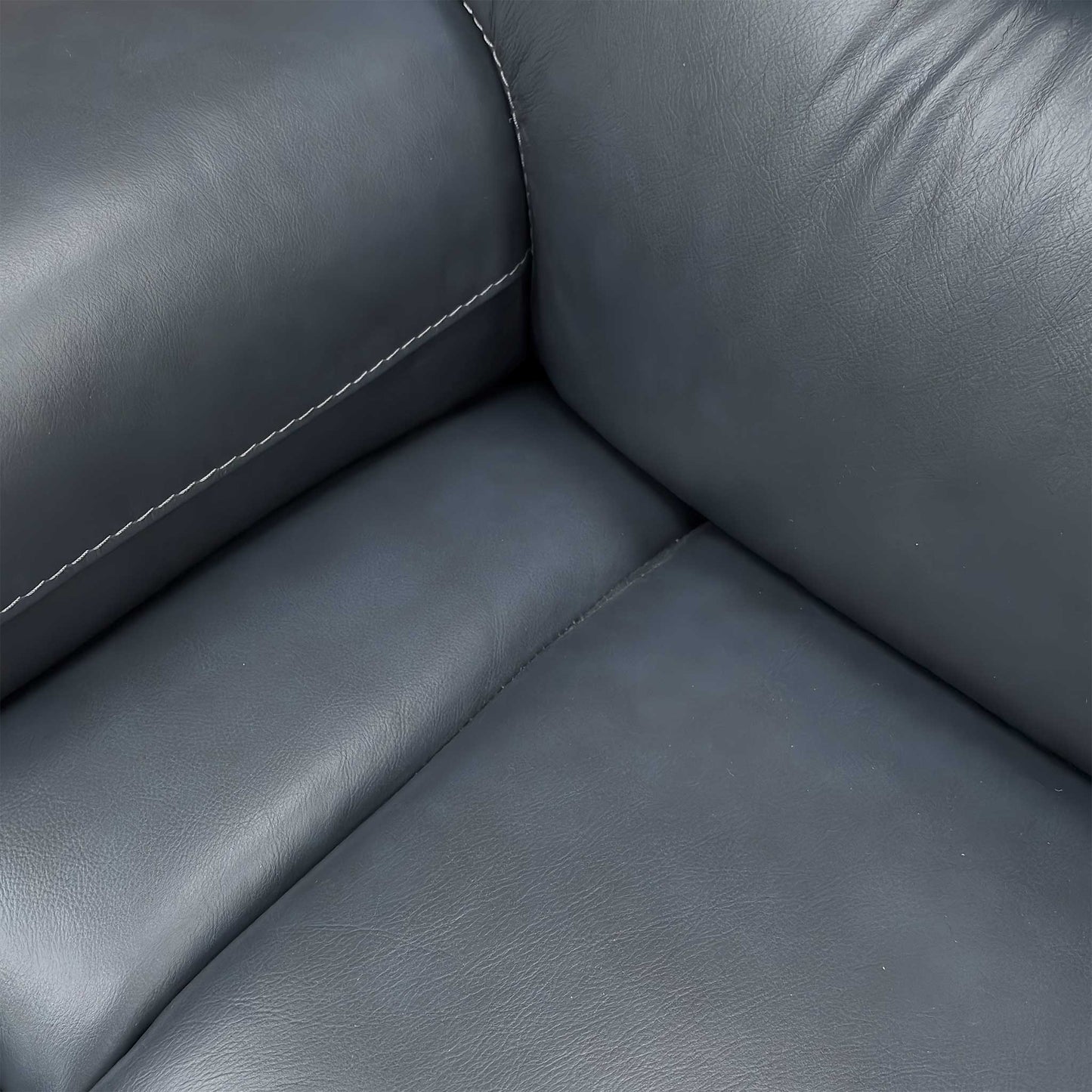 Close-up of the Natural Milled Navy LA 4828 leather, highlighting the premium pebbled texture, deep navy color, and expert tonal stitching.