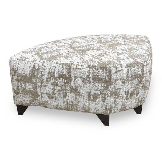 Full View The ‘Aura’ wedge footstool in Kai Mocha fabric, featuring a unique angled design and a plush, padded surface for use with corner sofas.