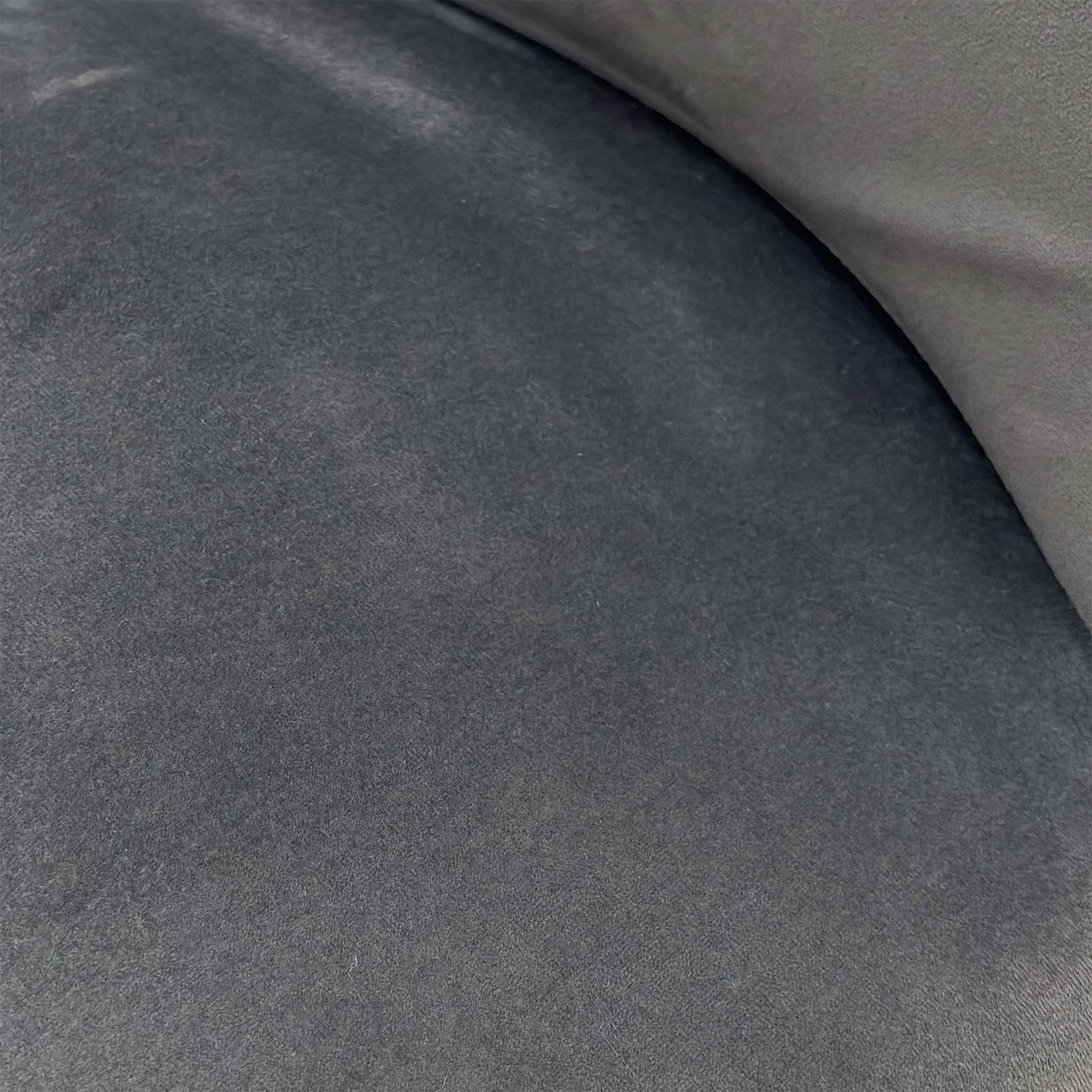 Close-up of the Grey Luxe velvet and silver studding, highlighting the plush texture of the fabric and the precision of the hand-applied metallic accents.