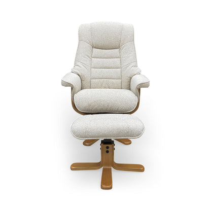 Front shot of the adjustable tilting headrest and sumptuous cushioning, designed for personalized neck support and head-to-toe comfort.