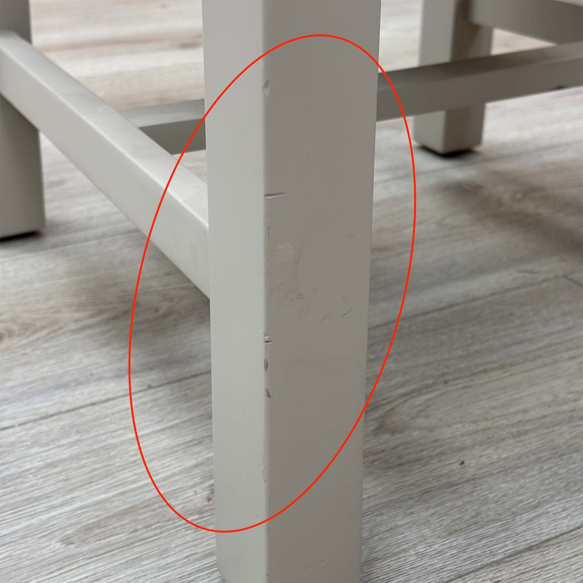 Detail shot focusing on the rear wood joints and slat back construction, demonstrating the high-quality craftsmanship and stability of the fixed frame.