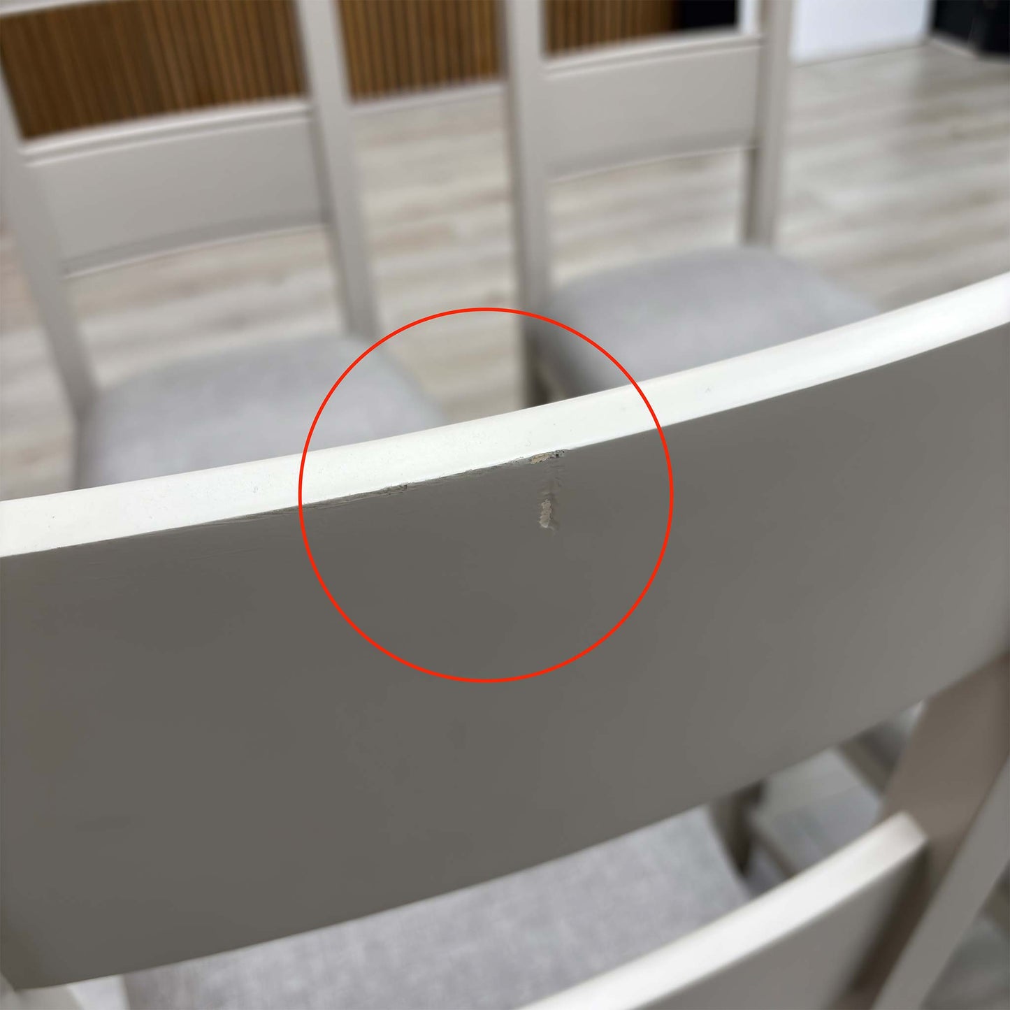 Detail shot focusing on the rear wood joints and slat back construction, demonstrating the high-quality craftsmanship and stability of the fixed frame.