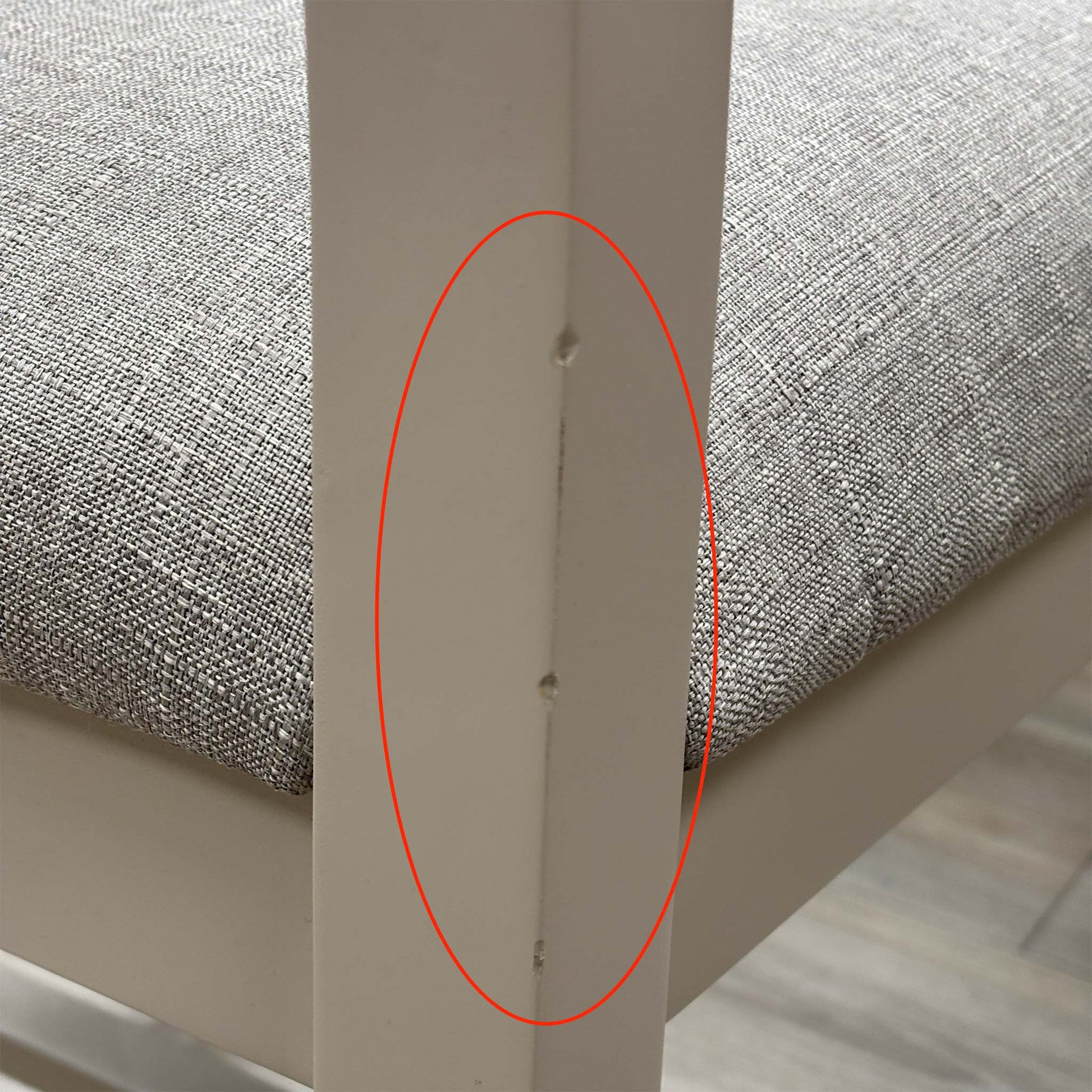 Detail shot focusing on the rear wood joints and slat back construction, demonstrating the high-quality craftsmanship and stability of the fixed frame.