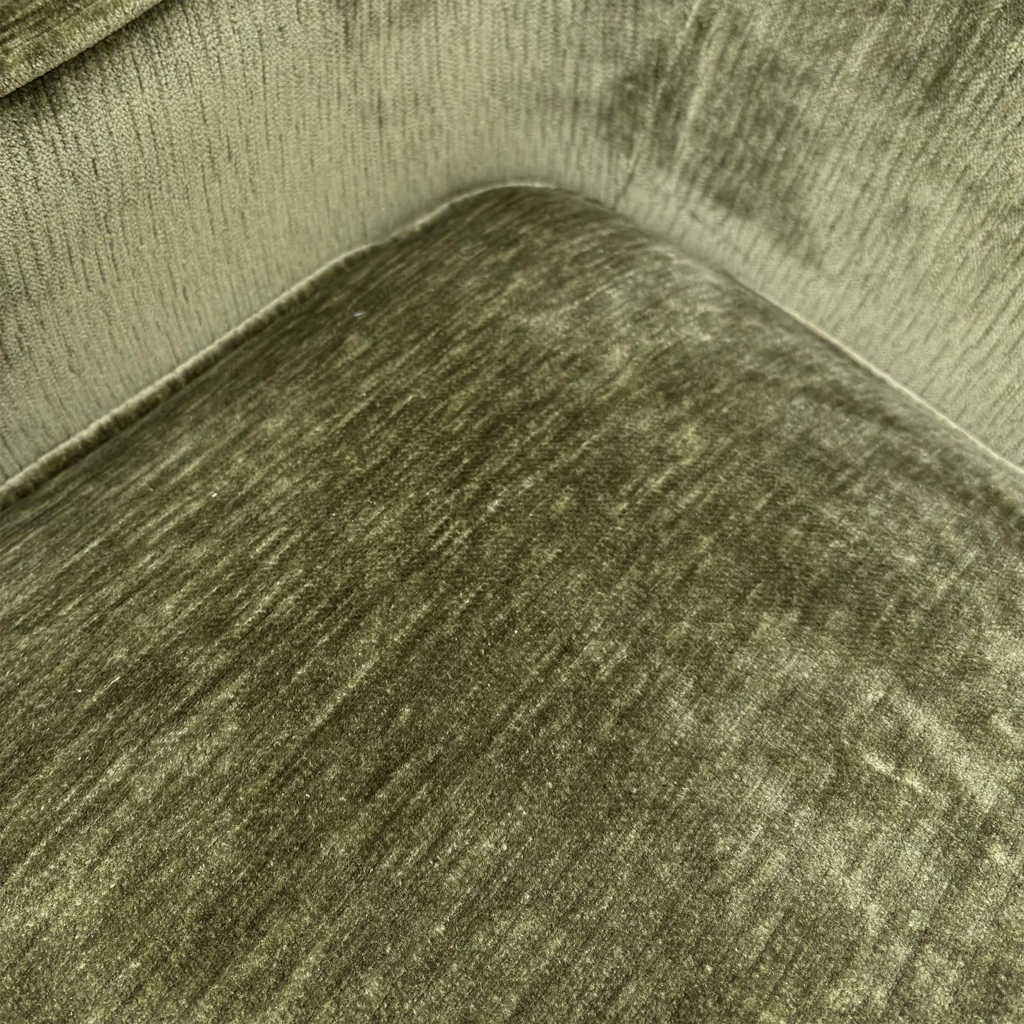Close-up of the California Olive Green chenille fabric, highlighting the dense soft-weave texture and the high-quality multi-tonal green threads.