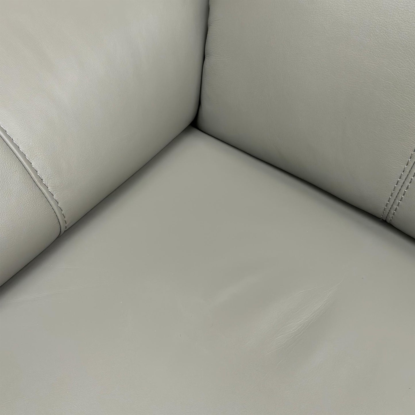 Close-up of the generously padded armrests on the Utah sofa, designed for enhanced comfort while reclining or sitting.