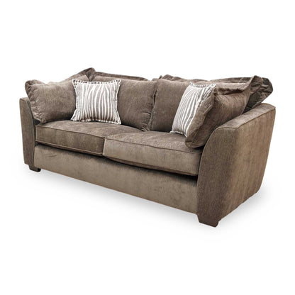 Side profile of the Finchley sofa, emphasizing the classic proportions and the graceful curve of the backrest and armrests.