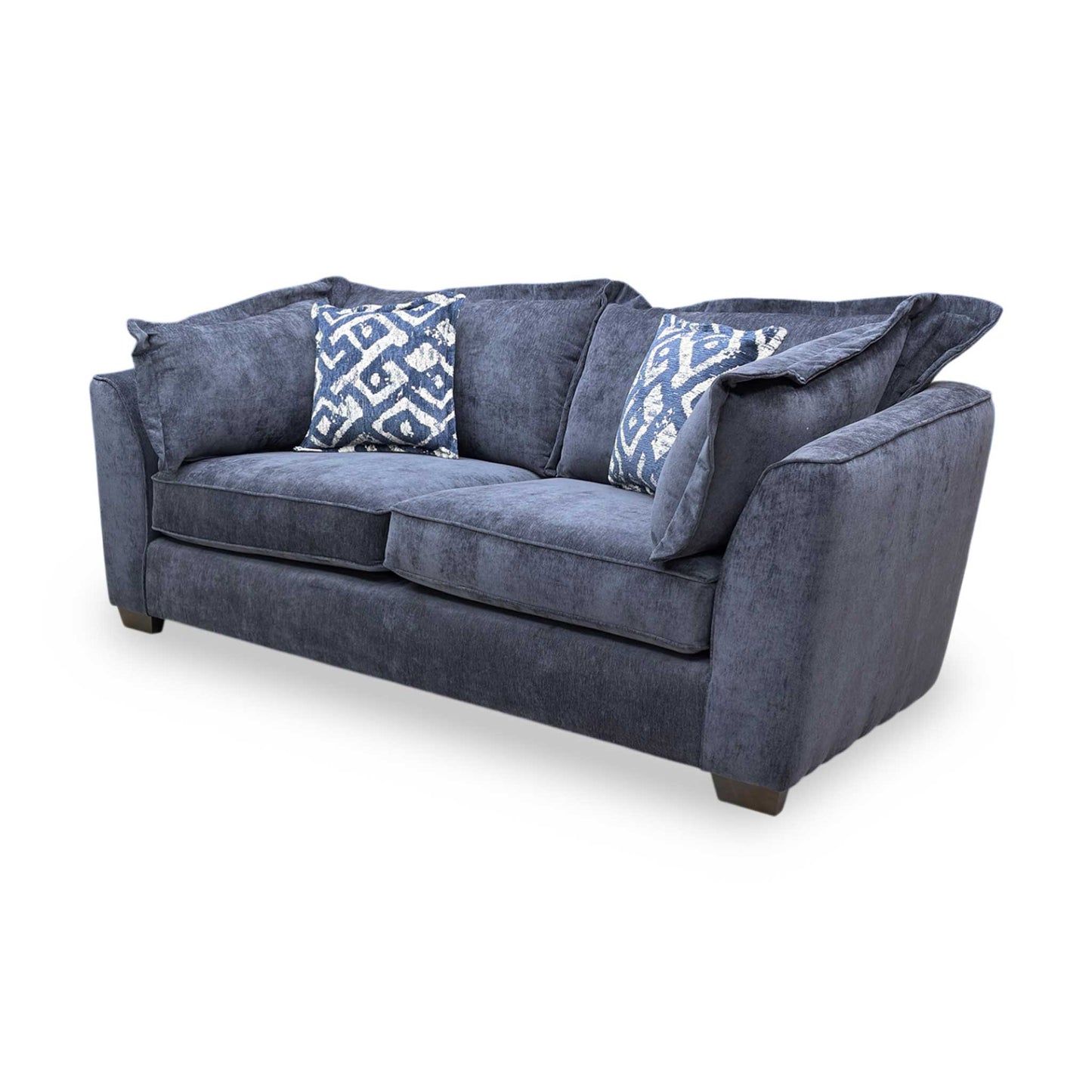 Side profile of the Finchley sofa, emphasizing the classic proportions and the graceful, supportive curve of the backrest and armrests.