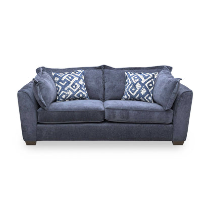 Front view of the Finchley sofa, emphasizing the classic proportions and the graceful, supportive curve of the backrest and armrests.
