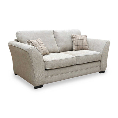 Side shot of the Sophie Sultan 2 seater sofa bed, showing the elegant armrest design and deep seating profile.