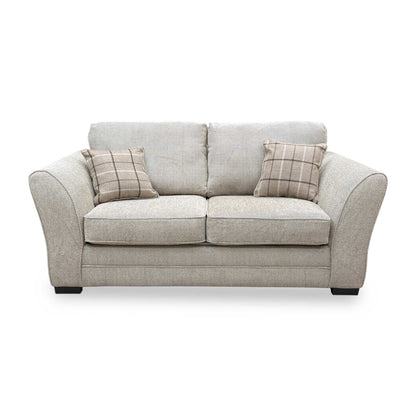 Front view of the Sophie Sultan sofa bed showing the cushioned formal back and plush seat pads.
