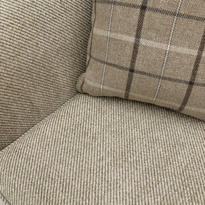 Macro detail shot of the Sophie Sultan sofa bed's stitching and finished edges in oatmeal woven material.