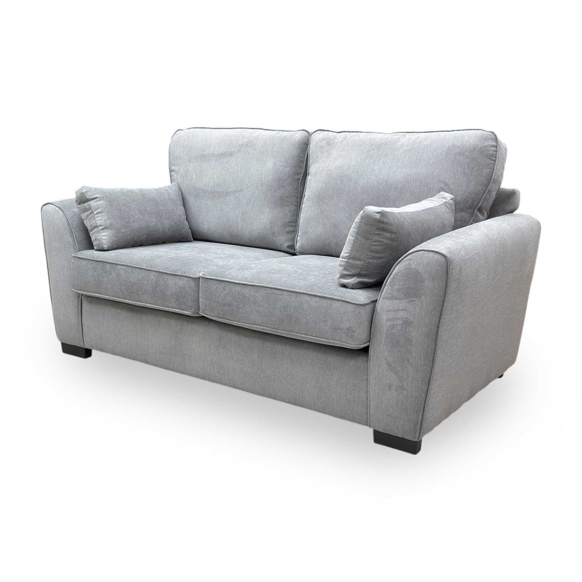 Side profile view of the Roma 2 seater sofa bed seat cushions demonstrating the spacious seating area for two.