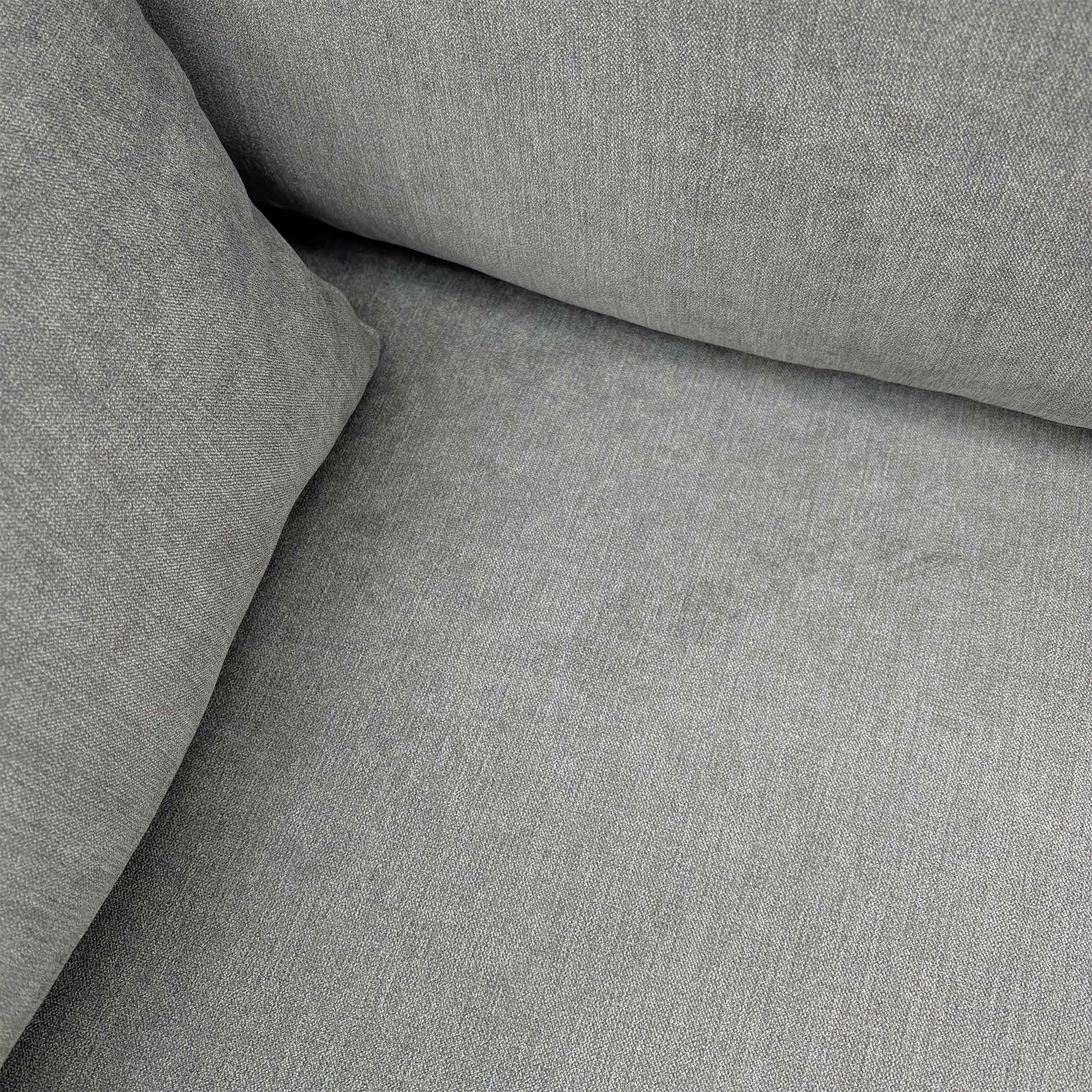 Close-up of the support feet and base construction of the Roma pewter grey sofa bed.
