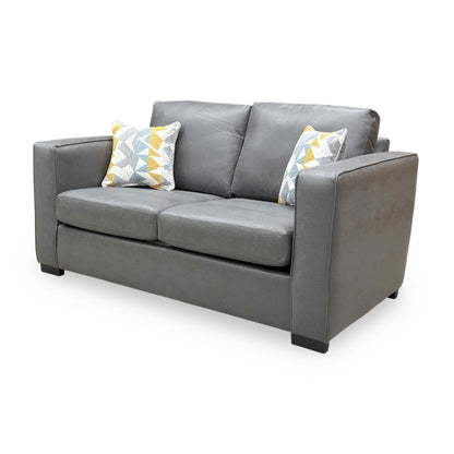 Side view of the Newton sofa bed, showing the clean lines and space-saving design perfect for small rooms or offices.